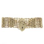 A gold gate-link bracelet, with 9ct gold padlock clasp.