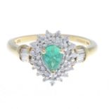 A 14ct gold green tourmaline and diamond dress ring.Estimated total diamond weight 0.25ct.