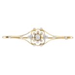 An early 20th century diamond and seed pearl bar brooch.Estimated total diamond weight 0.25ct,