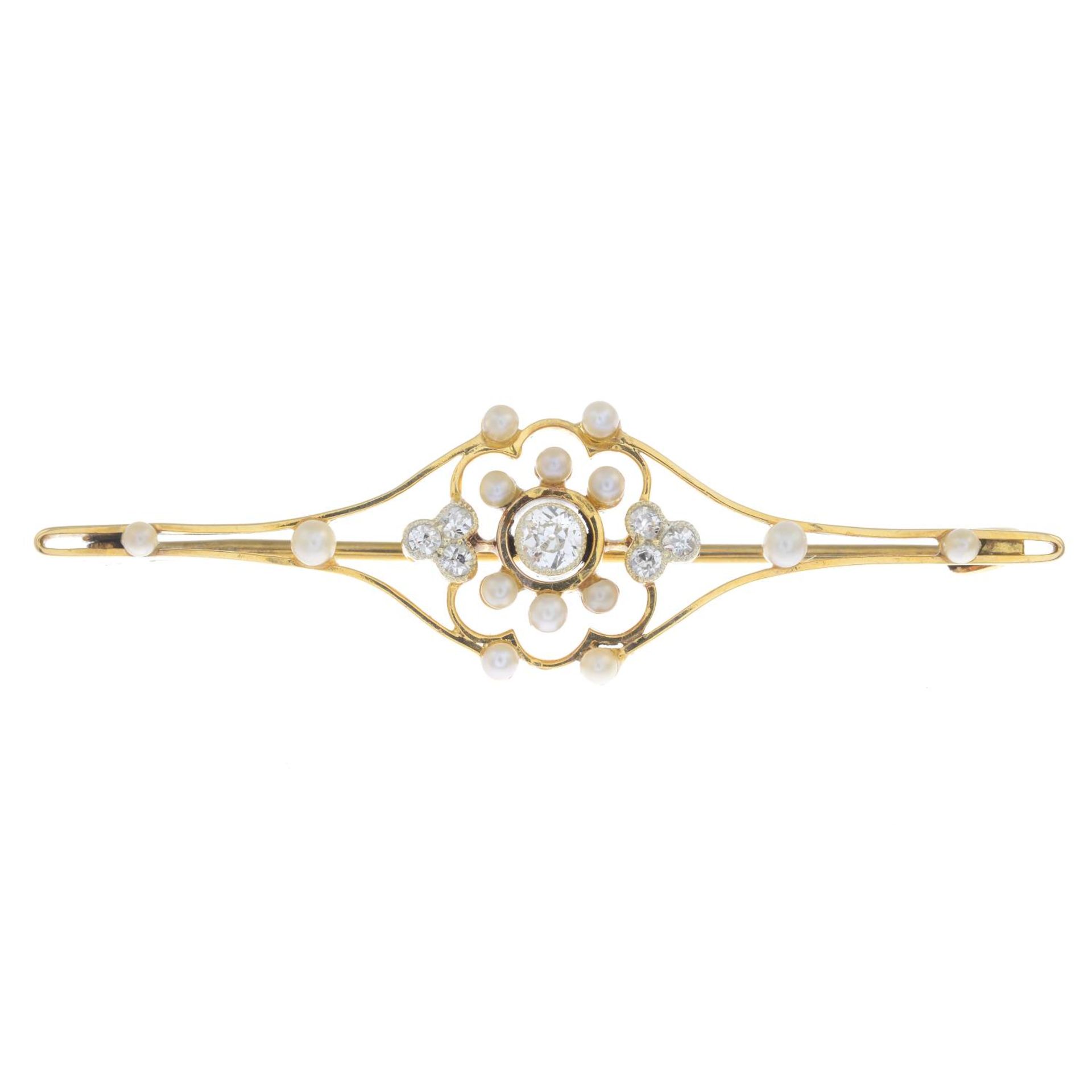 An early 20th century diamond and seed pearl bar brooch.Estimated total diamond weight 0.25ct,