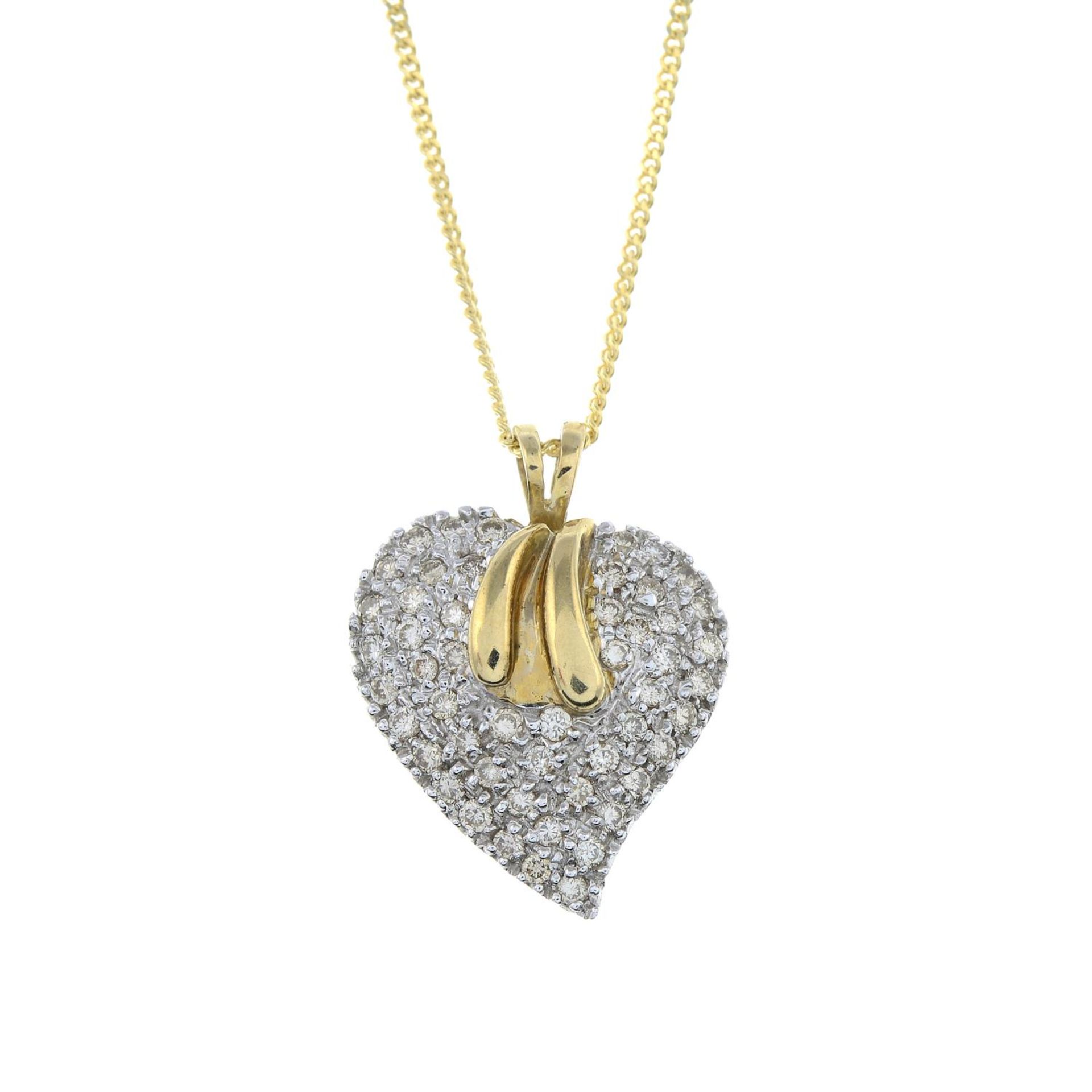 A 9ct gold brilliant-cut diamond heart pendant, with 9ct gold chain.