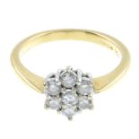 An 18ct gold diamond cluster ring.Total diamond weight 0.50ct, stamped to band.