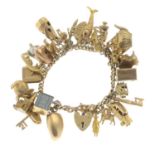 A charm bracelet, suspending thirty charms.Bracelet stamped 15 625.