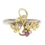 An 18ct gold ruby and diamond floral dress ring.Hallmarks for 18ct gold.