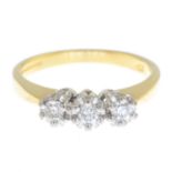 An 18ct gold brilliant-cut diamond three-stone ring.Estimated total diamond weight 0.20ct,