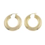 A pair of 9ct gold earrings.Import marks for Birmingham.Length 3.5cms.