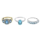 Three 9ct gold blue topaz rings,