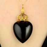 A late Victorian gold, emerald and ruby crowned smokey quartz heart pendant.Length 6.6cms.