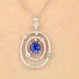 A sapphire and diamond cluster necklace.