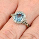 An Edwardian platinum and 18ct gold aquamarine and old-cut diamond ring.Aquamarine calculated