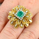 A mid 20th century emerald and diamond bi-colour floral cluster ring.