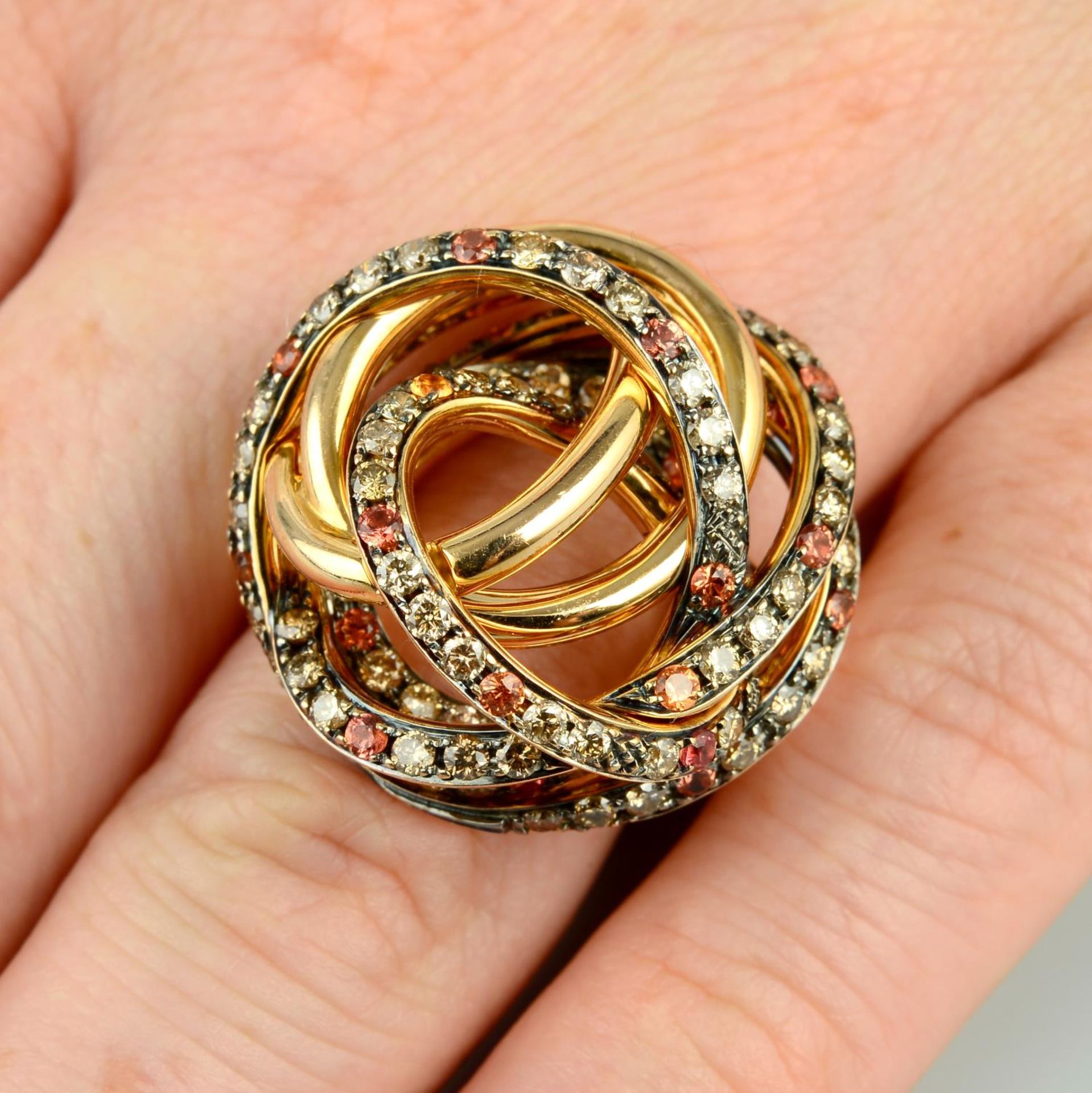 An 18ct gold 'coloured' diamond and orange sapphire 'Matassa' ring,