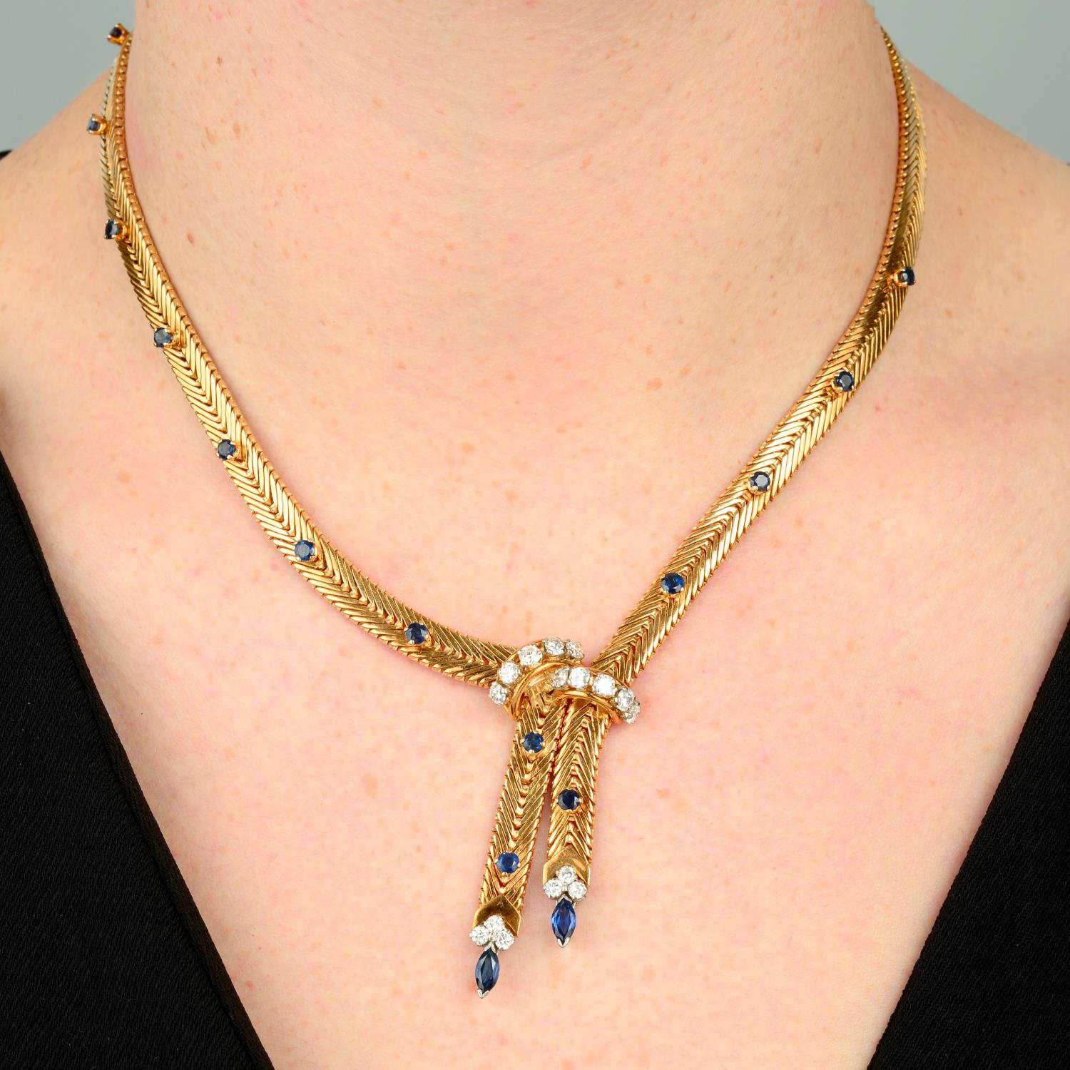 A 1960s 18ct gold sapphire and diamond necklace, by Kutchinsky.