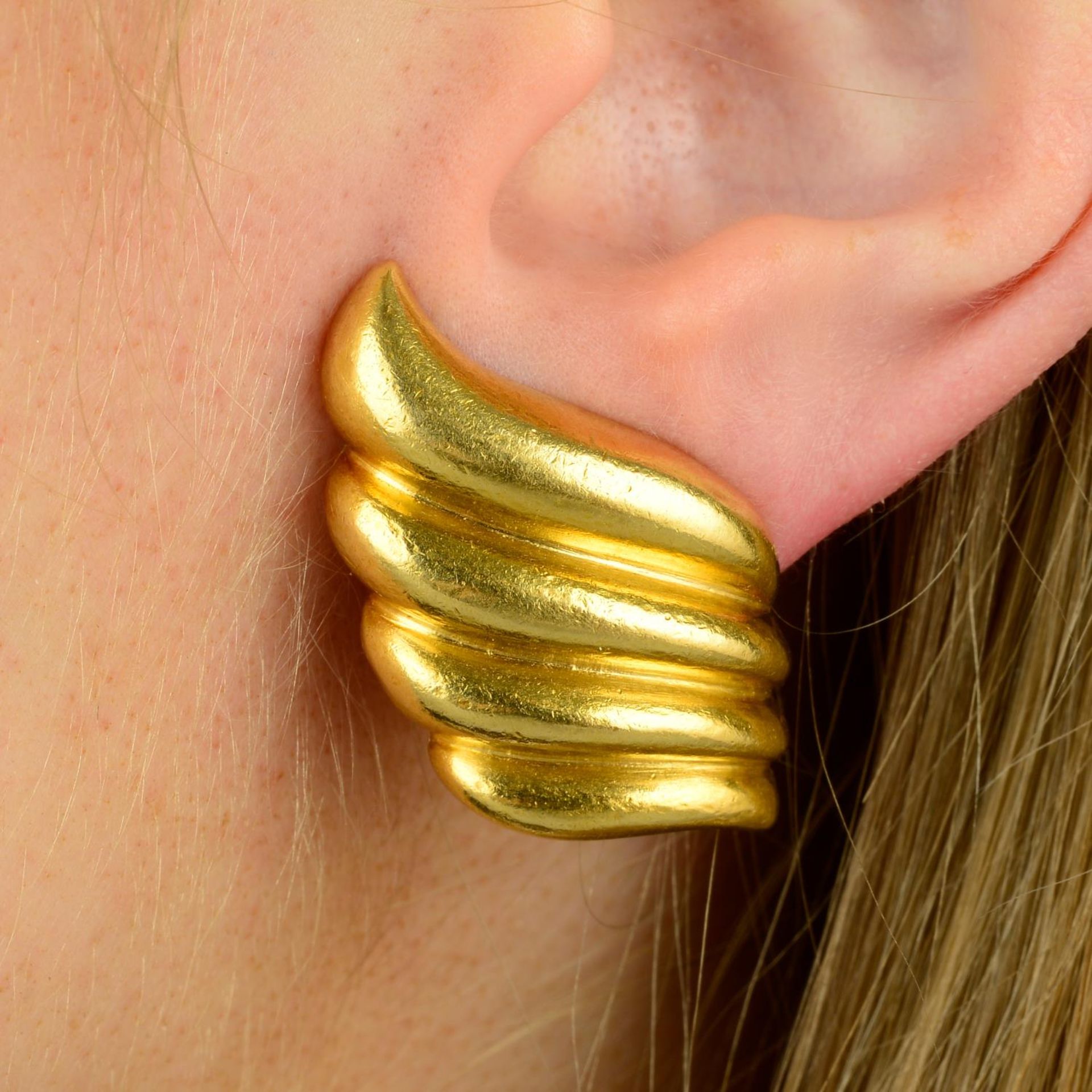 A pair of stylised shell earrings, by Zolotas.Stamped 22K.