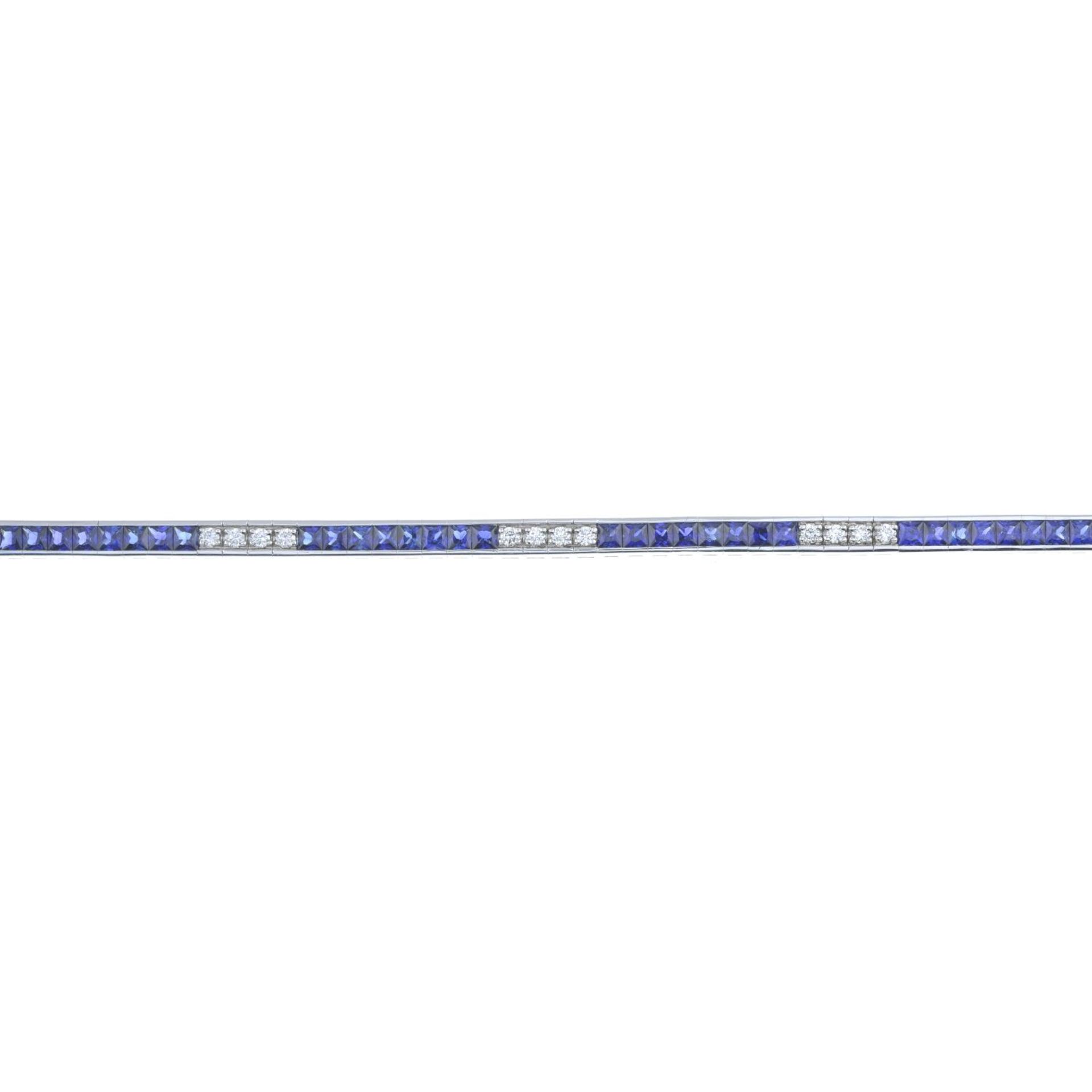 An 18ct gold calibre-cut sapphire and brilliant-cut diamond line bracelet.Estimated total sapphire - Bild 2 aus 4