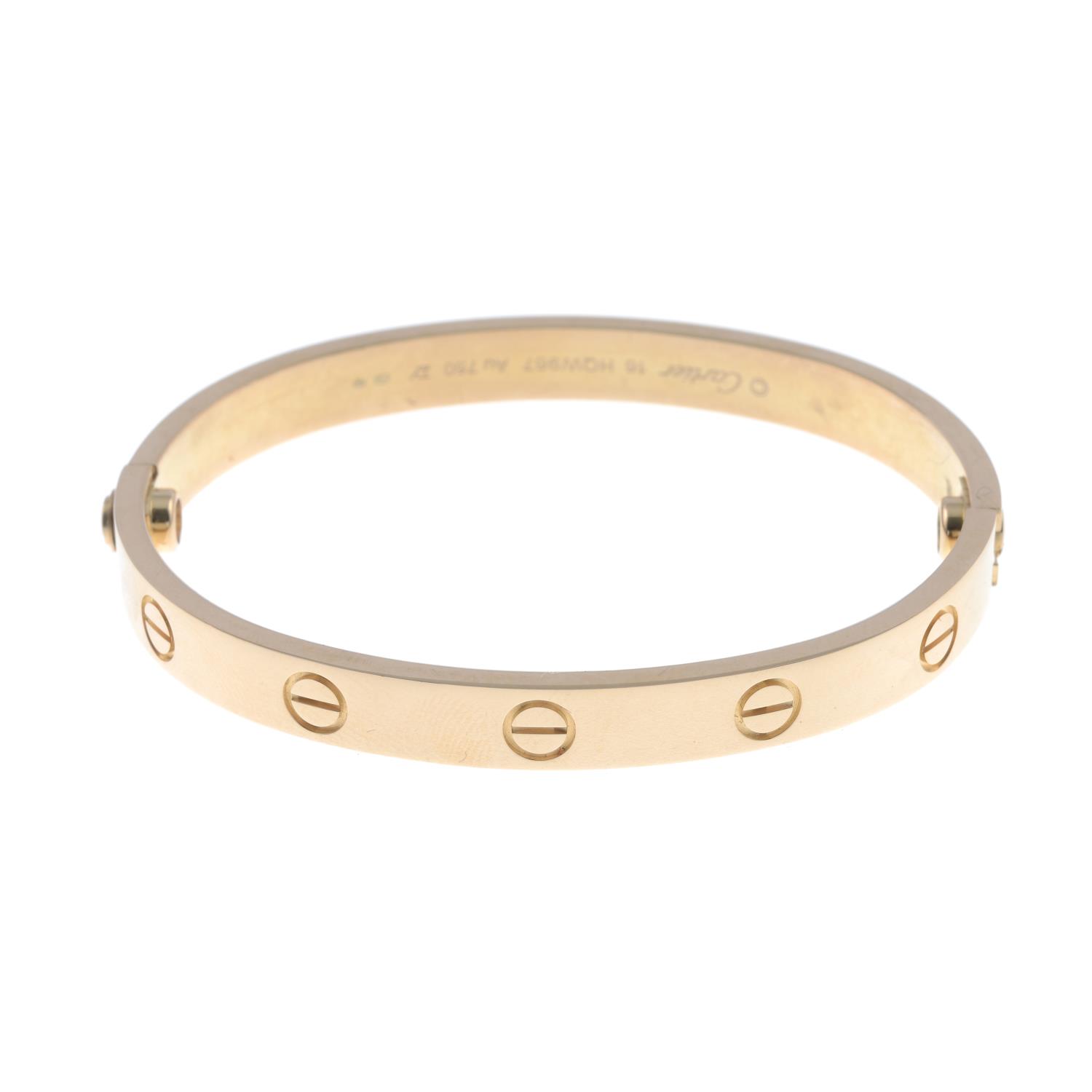 An 18ct gold 'Love' bangle, by Cartier.Swiss convention marks. - Image 4 of 4