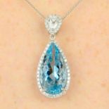 An 18ct gold aquamarine and diamond pendant.