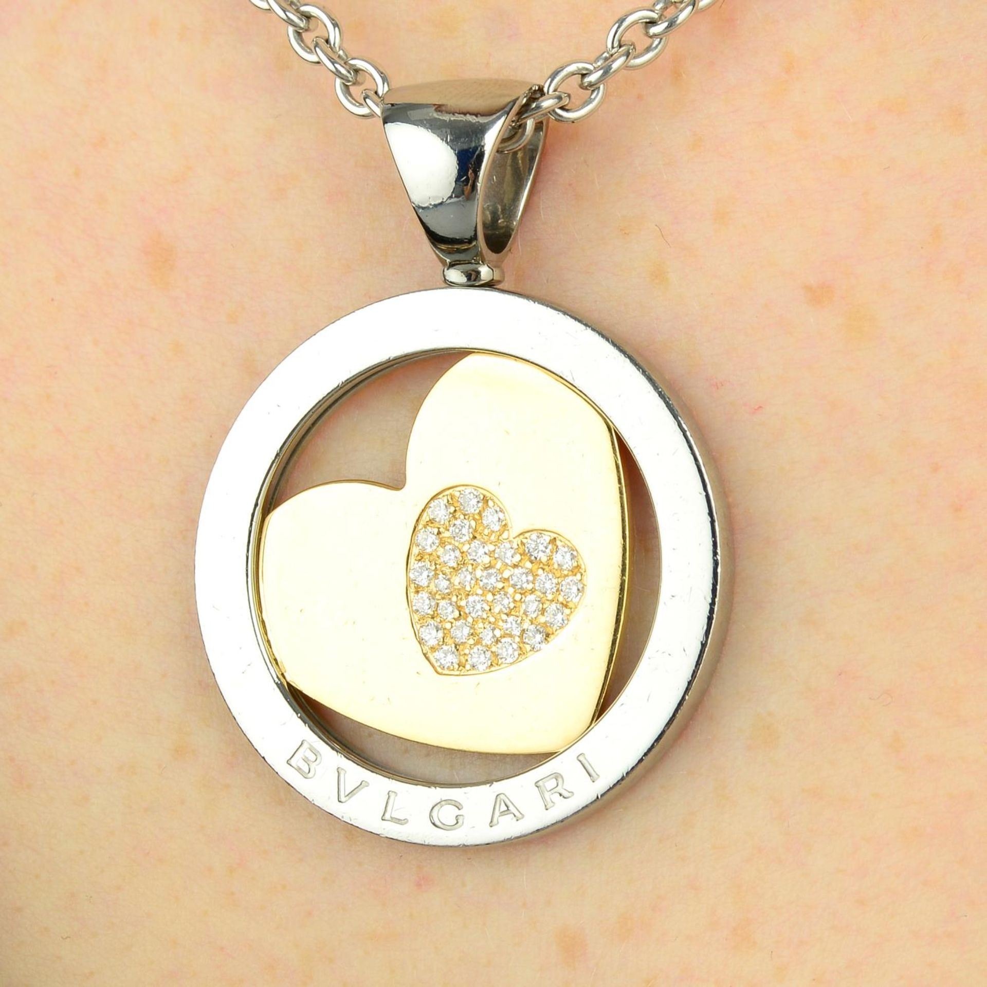 A pave-set diamond heart 'Tondo' pendant,