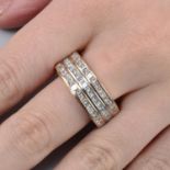 A square-shape diamond three-row rotating band ring.Total diamond weight 5.40cts,