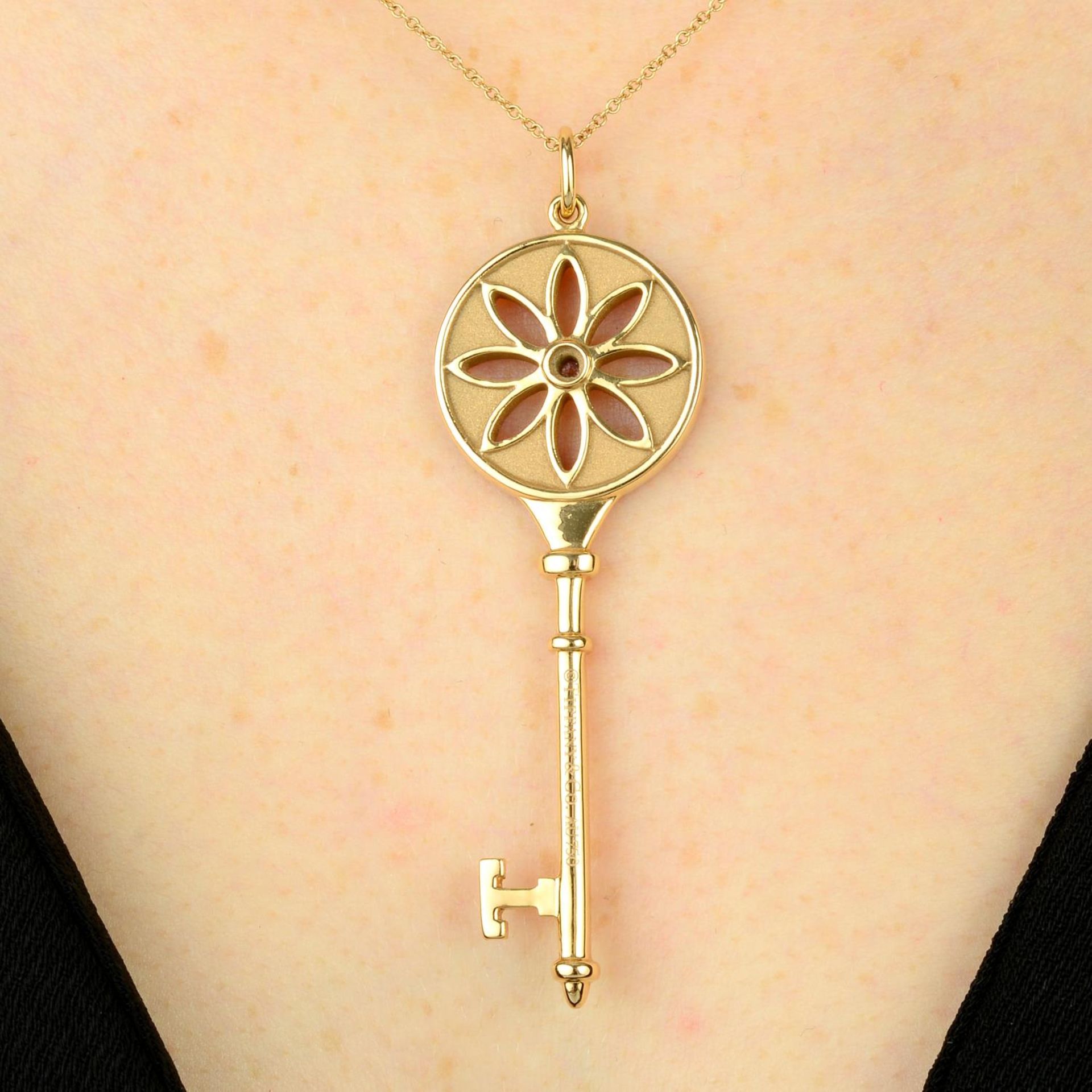 An 18ct gold diamond 'Daisy Key' pendant,