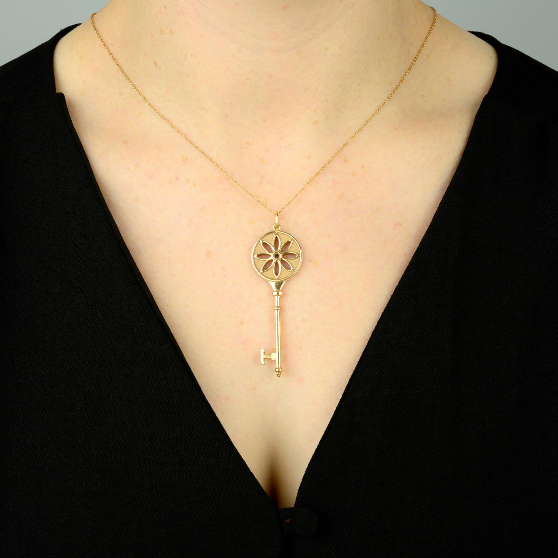 An 18ct gold diamond 'Daisy Key' pendant, - Image 3 of 5