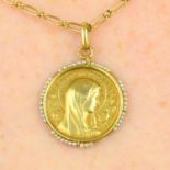 A mid 20th century 18ct gold religious medallion pendant,