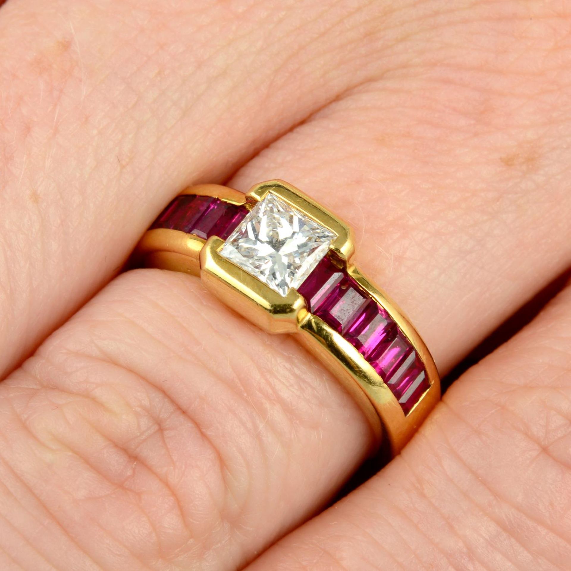 A square-shape diamond and calibre-cut ruby dress ring,