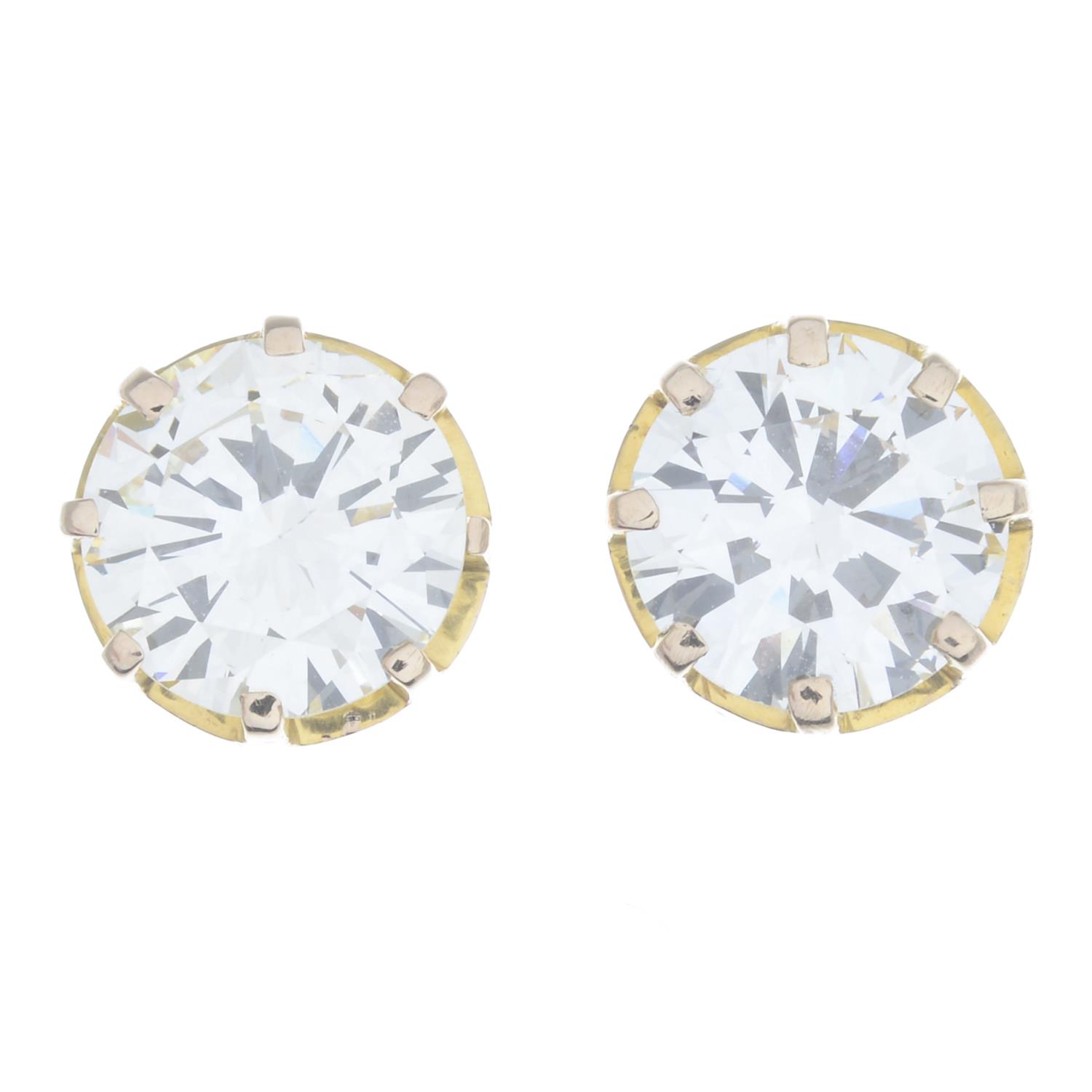 A pair of brilliant-cut diamond stud earrings. - Image 2 of 4