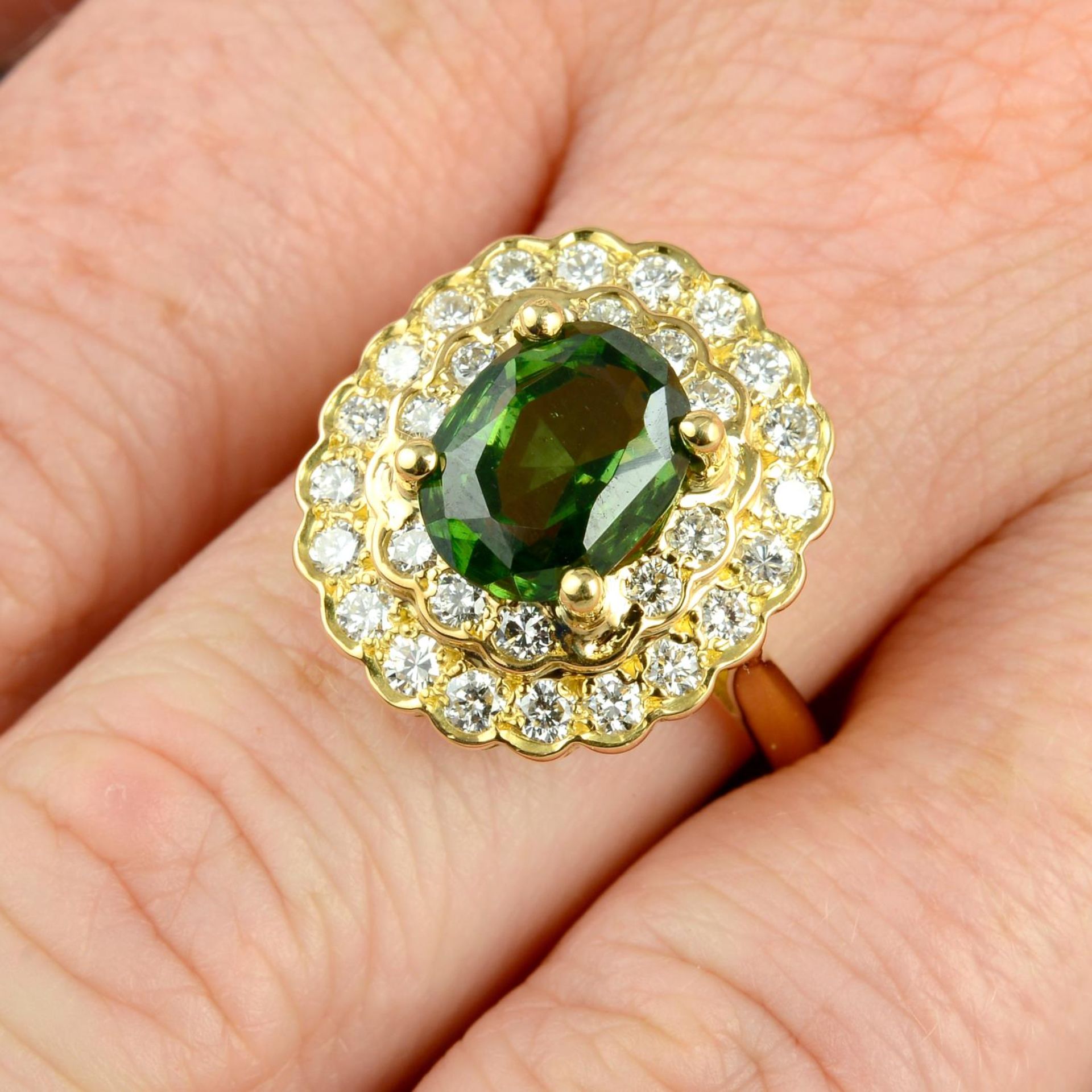 A green zircon and diamond cluster ring.