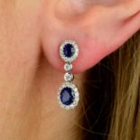 A pair of sapphire and diamond cluster drop earrings.