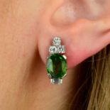 A pair of green zircon and vari-cut diamond earrings.