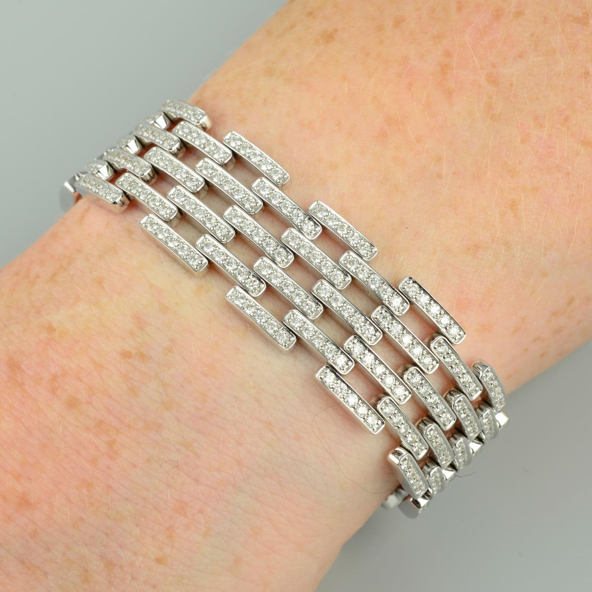 An 18ct gold pave-set diamond brick-link bracelet.Estimated total diamond weight 6cts,