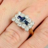An 18ct gold sapphire and diamond dress ring.Total diamond weight 1.10cts,