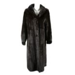 SAGA - a full-length dark ranch mink coat.