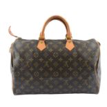 LOUIS VUITTON - a Monogram Speedy 35 handbag.