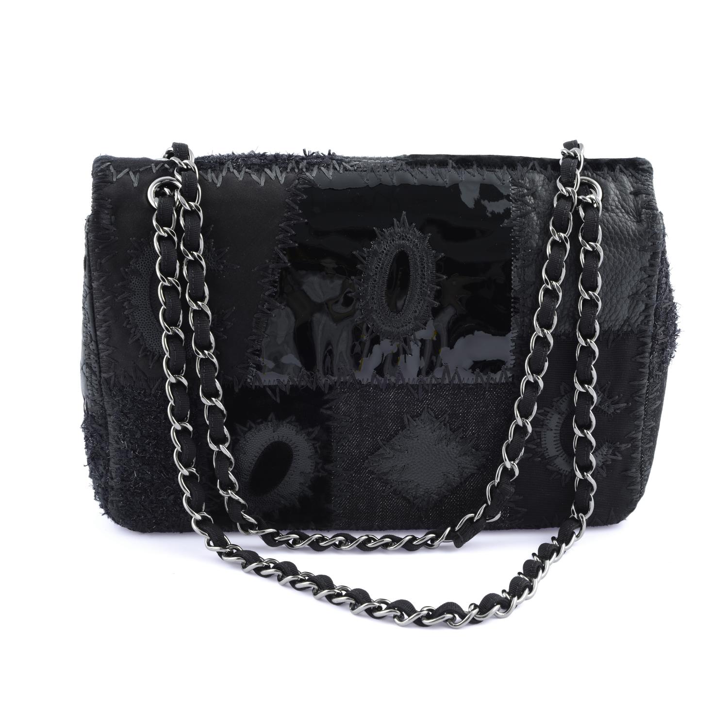 CHANEL - a black Patchwork Flap handbag. - Image 2 of 4