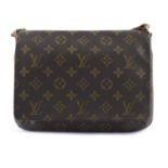 LOUIS VUITTON - a Monogram Musette Tango handbag.