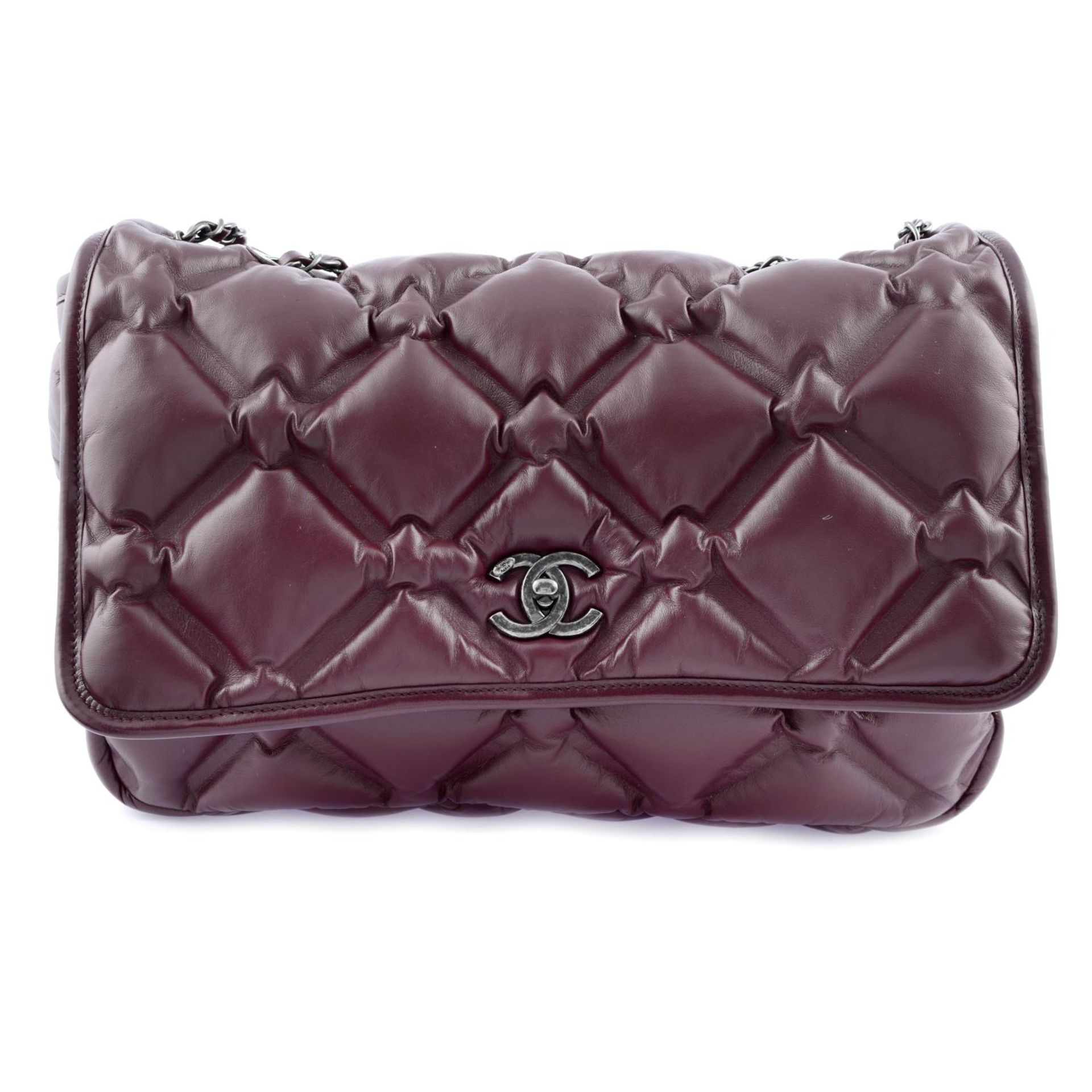 CHANEL - a burgundy quilted Bubble Chesterfield handbag.