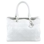 CHRISTIAN DIOR - a white Cannage handbag.