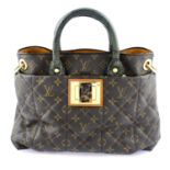 LOUIS VUITTON - a Monogram Etoile Exotique handbag.