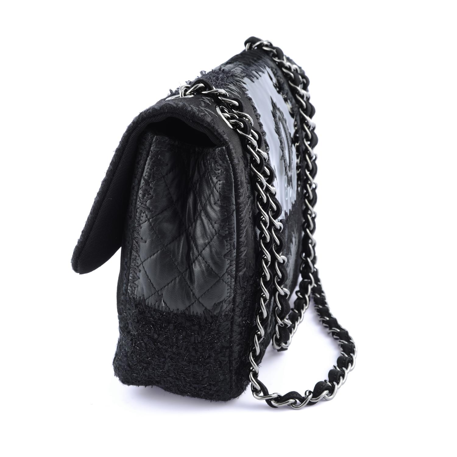 CHANEL - a black Patchwork Flap handbag. - Image 3 of 4