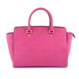 MICHAEL KORS - a fuchsia pink Selma handbag.