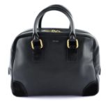 CÉLINE - a leather handbag.