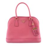 PRADA - a pink Saffiano Lux handbag.