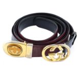 GUCCI - two vintage belts.To include a reversible example with twist buckle detail,