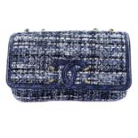 CHANEL - a Medium Quilted Tweed Filigree Flap handbag.