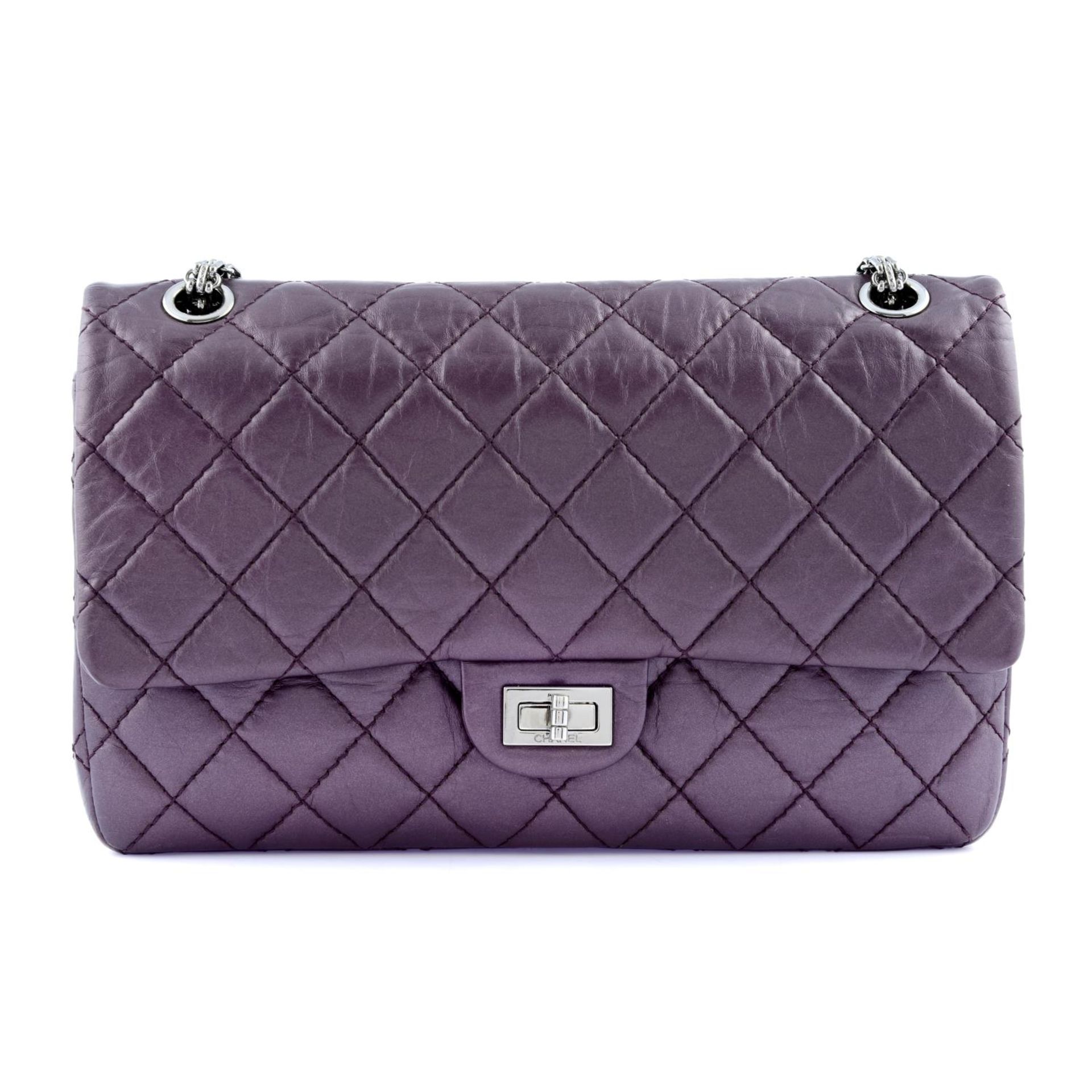 CHANEL - a purple 2.55 Reissue 226 handbag.