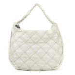 CHANEL - a lambskin quilted Hidden Chain hobo handbag.