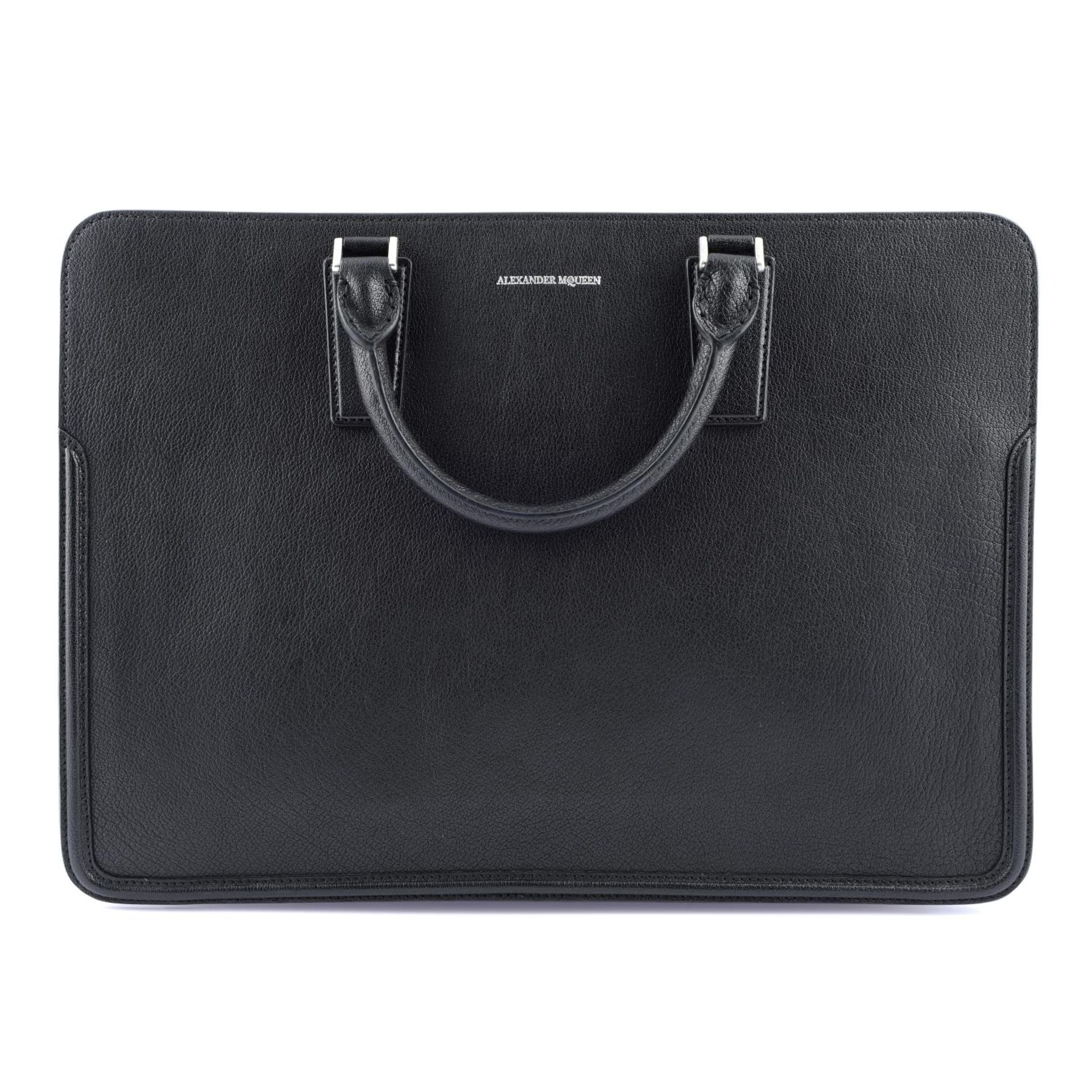 ALEXANDER MCQUEEN - a black leather briefcase.