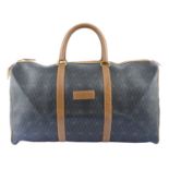 CHRISTIAN DIOR - a honeycomb coated canvas Boston 55 luggage bag.